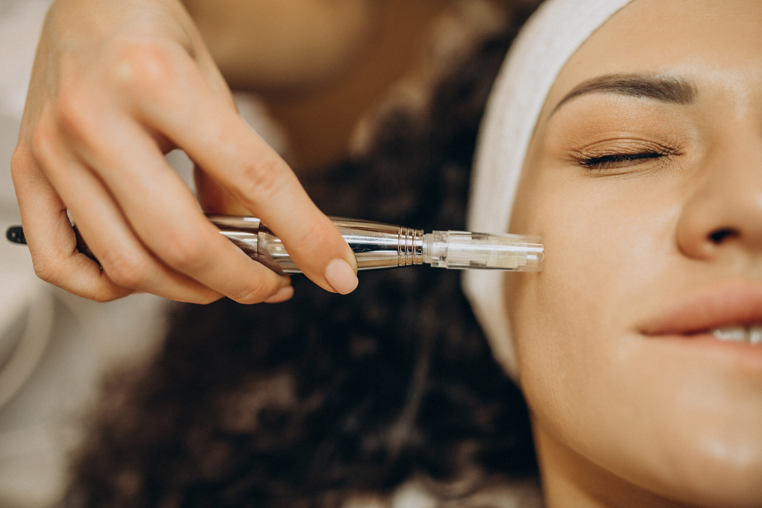 woman cosmetologist making beauty procedures scaled
